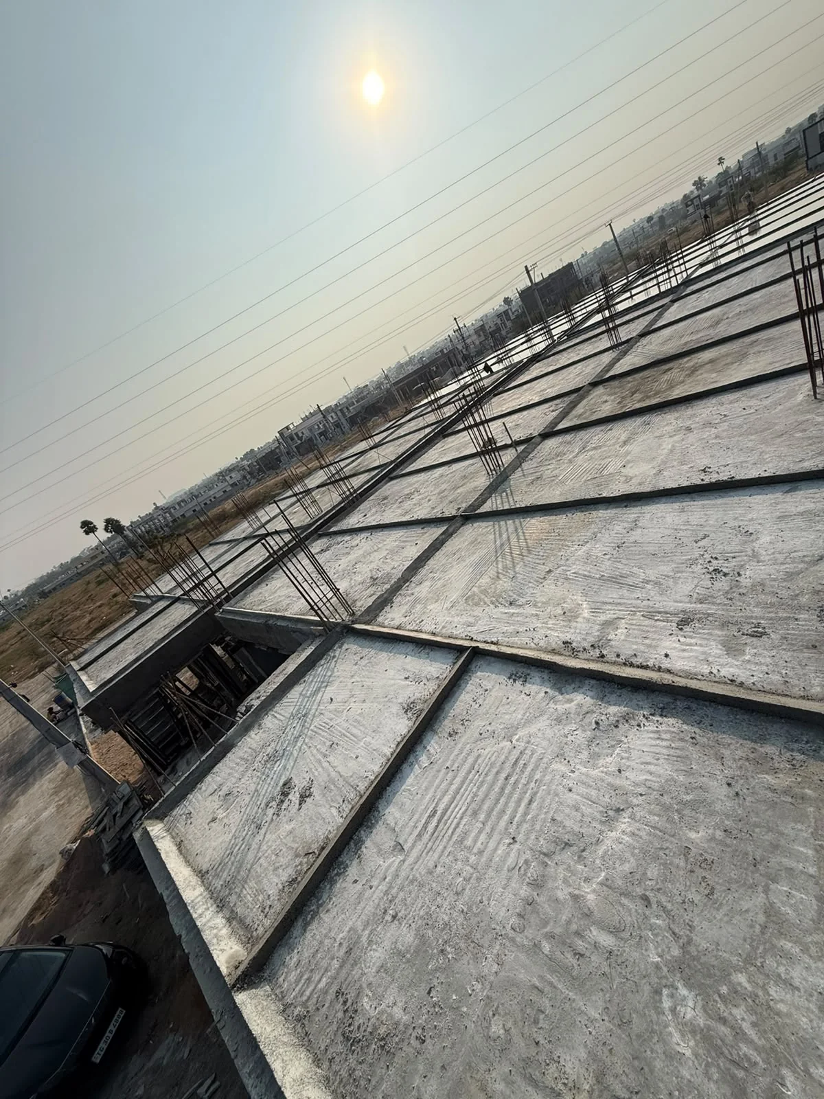 Cured slab and column reinforcement